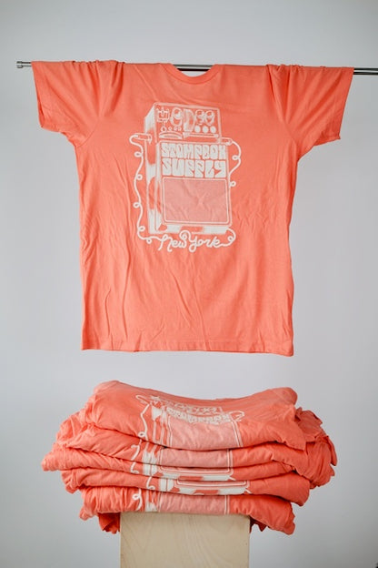 Coral tee with ivory ink