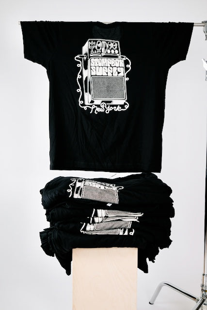 Black tee with ivory ink