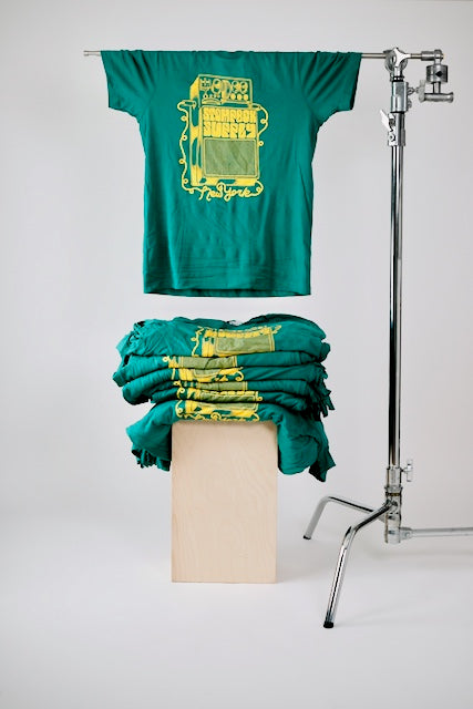 Green tee with yellow ink